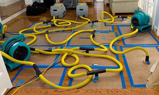 Professional Flood Damage Restoration technician working in Jefferson, WI